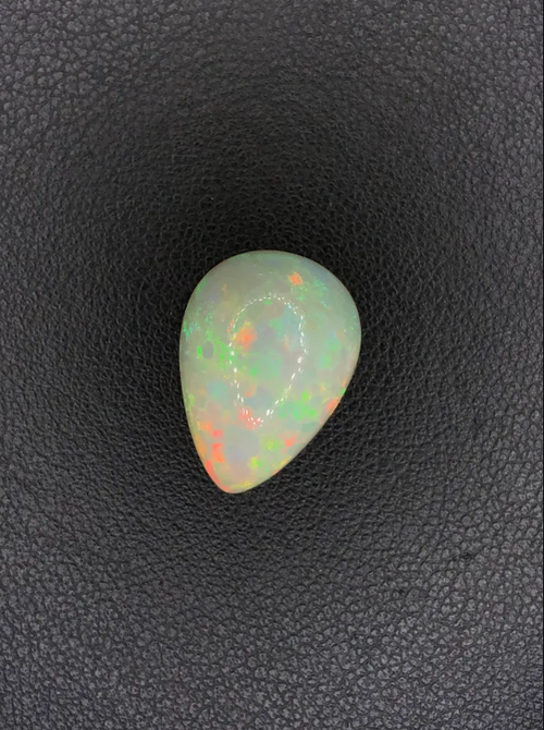 Gem Stone  - Color (Orange Semi-Transparent) - Shape (Pear Cabochun) - Species (Natural OPAL) - 8.97-carat