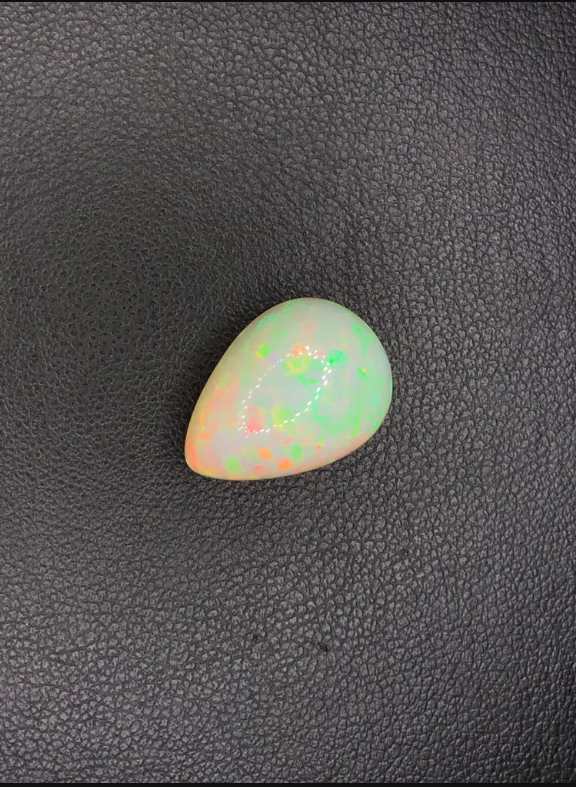 Gem Stone  - Color (Orange Semi-Transparent) - Shape (Pear Cabochun) - Species (Natural OPAL) - 8.97-carat