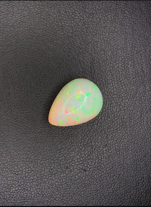 Gem Stone  - Color (Orange Semi-Transparent) - Shape (Pear Cabochun) - Species (Natural OPAL) - 8.97-carat