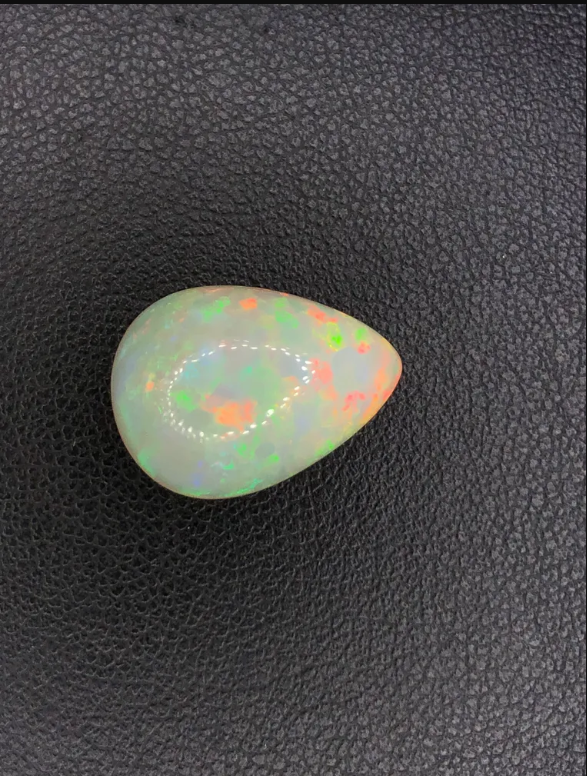 Gem Stone  - Color (Orange Semi-Transparent) - Shape (Pear Cabochun) - Species (Natural OPAL) - 8.97-carat